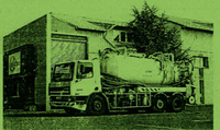 Image d'un des camion de la société COVED qui propose des vidanges de fosses septiques.