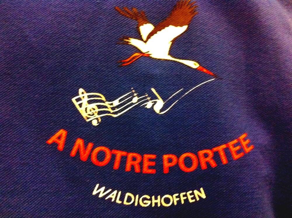 Le logo de l'Ecole de Musique de la Concordia sur un t-shirt