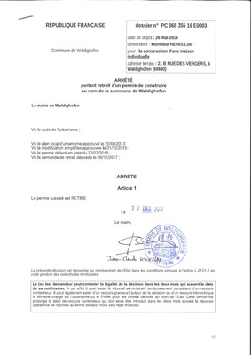 Arrêté portant retrait d'un permis de construire - M. HEINIS