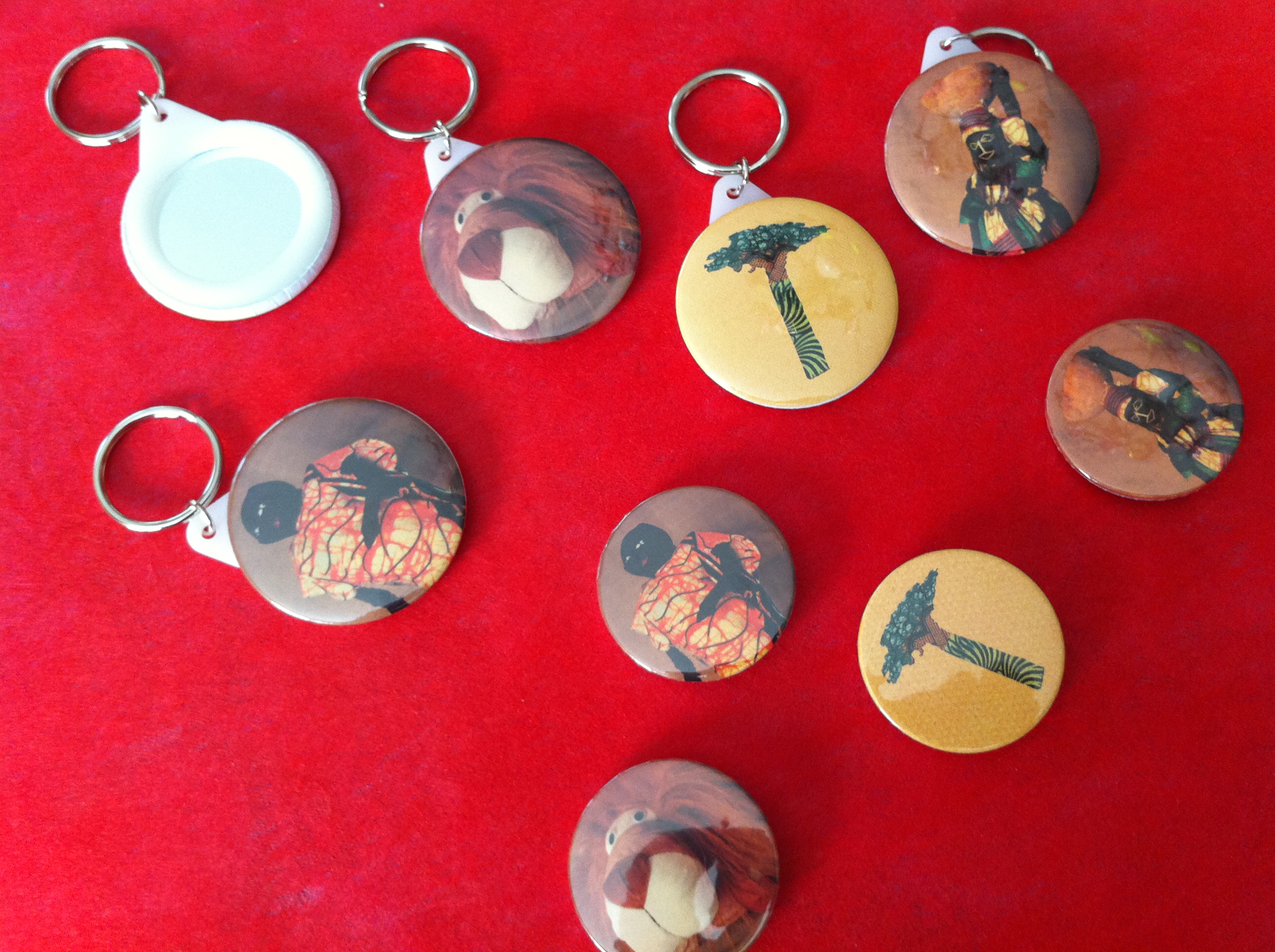 Porte-clés miroir et pin's Asukilé et le vieux lion