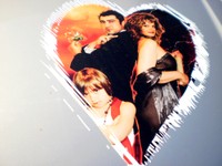 Magnifique logo : la couverture du livre "Ahhh, l'Amour" dans un coeur