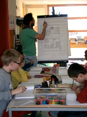 Alexandre Gimbel et des élèves de son atelier